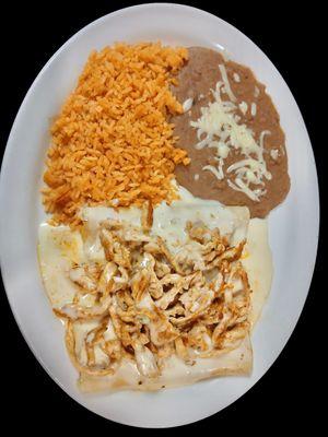 Chiapas Special: 3 Cheese enchiladas topped with grilled chicken or steak, Smothered in cheese sauce served with a side of rice and beans.