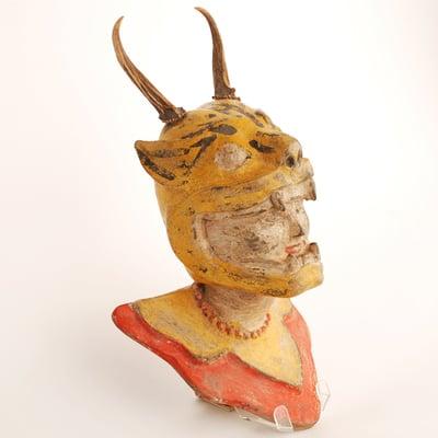 This rare folk art figure was acquired in Burma and dates from the early 20th century.