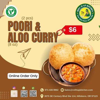 Deep fried whole wheat bread with potato or Chana masala curry based on availability.