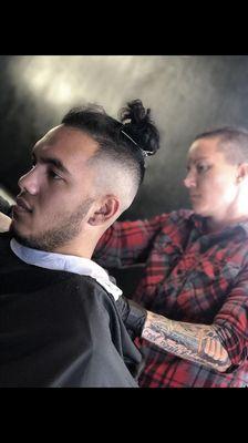 Hit 'em with a high fade and a man bun.