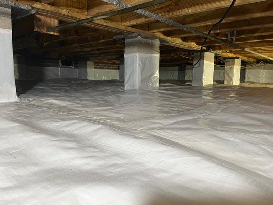 Crawl space cleaned and encapsulated.