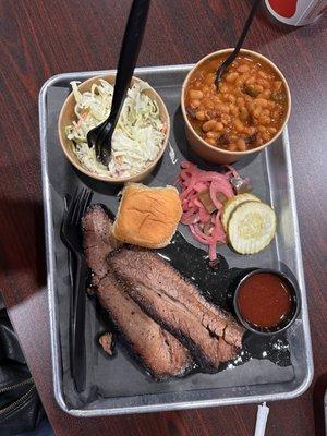 Brisket, Cole slaw, sweet and Smokey cowboy beans, dill pickles and onion, dinner roll