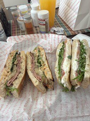 Pastrami (left), Procuitto (right). In the background: empty Lactaid wrappers, for the generous amount of cheese.