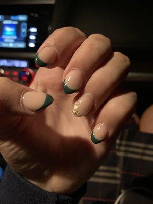 Green French tip nails with foil accent