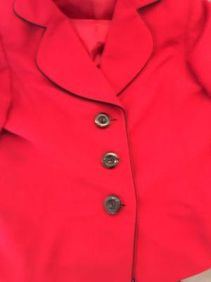Red jacket with missing button found and sewn back on!