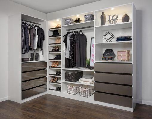 White finish with contrasting drawers. Closet lighting