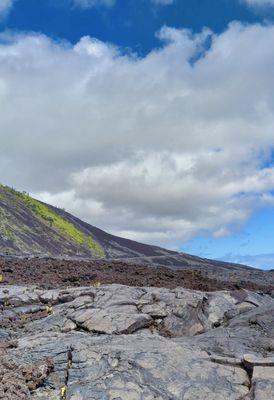 Chain-of-Craters Road, at the foot of the 1500'h Holei Pali escarpment. Switchbacks cross up the ridge to the Kealakomo Overlook.
