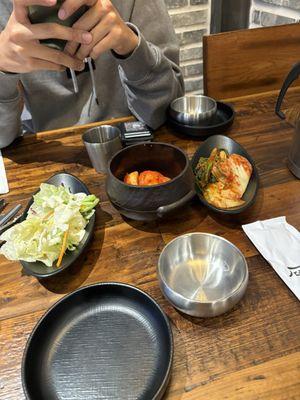This is the sides we got, the radishes were really good and the kimchi was great.