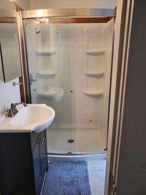 Aston curved shower enclosure.