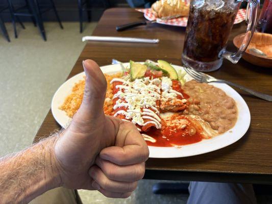 Dad giving the enchiladas a strong thumbs up!