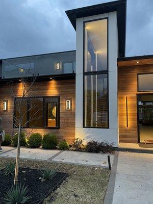 Glass patio railing. Front of house