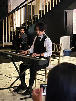 My little brother playing Canon in D for us (bride & groom) at reception/dinner time.