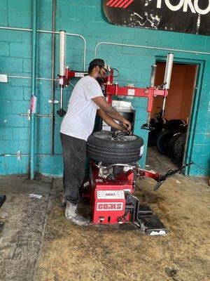 Installing a new tire on a rim in Lampasas, TX at All Season Tires