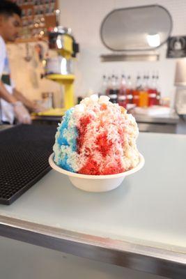 Strawberry vanilla shave ice with snow cap. So big for the price. Looks bigger in person.