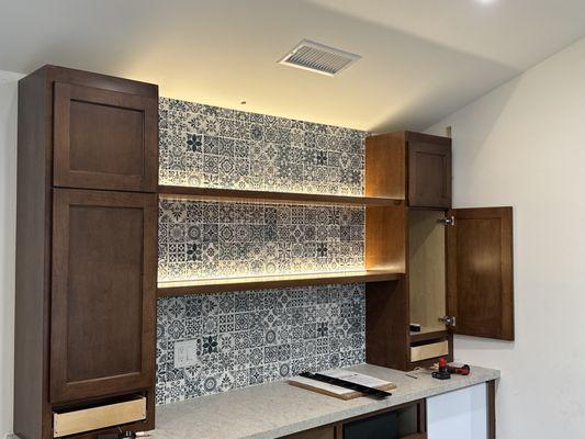 Shelf lights at this beautiful bar