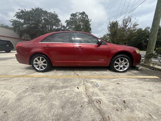 The front tire is viably smaller than the rear.