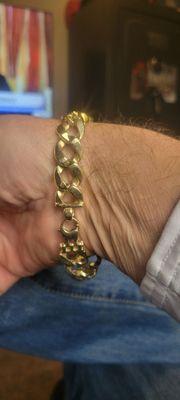 2 ounces, 14kt Gold purchased from here in 1988 by my father. My father passed away in November 2022. Now i have it.