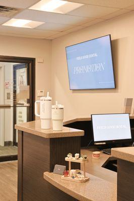 The waiting area and front desk at Feels Good Dental in Fort Lee, NJ.