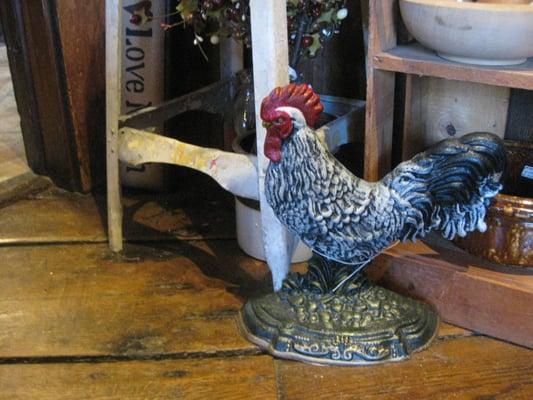 Iron birdbaths, doorstops and decorative items.