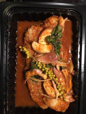 Catfish, it does come with white rice on the side.