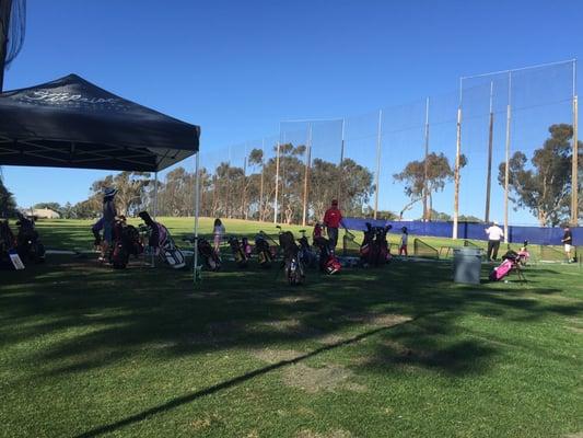 Kids swinging some shots