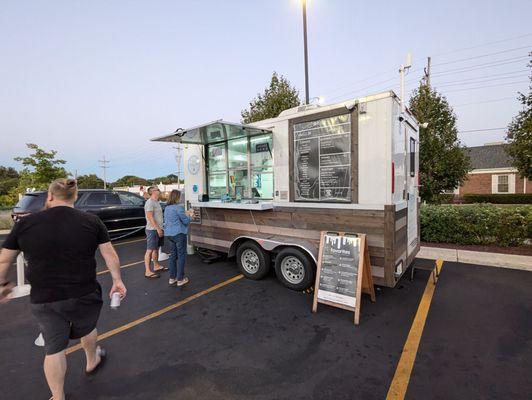 Parked outside the Brown Bag Seafood Co.
