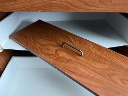 broken dresser drawer at check in