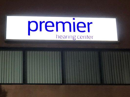 Premier Hearing Center at night