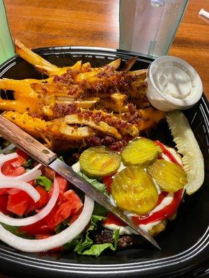 Burger (gluten free without bun) with Cheddar, bacon fries.