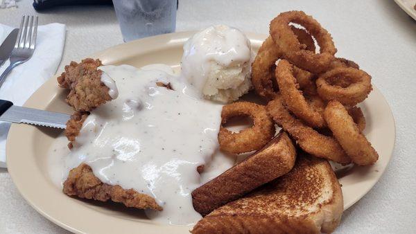 delicous chicken fried steak/mashed potatoes & perfectly fried onion rings