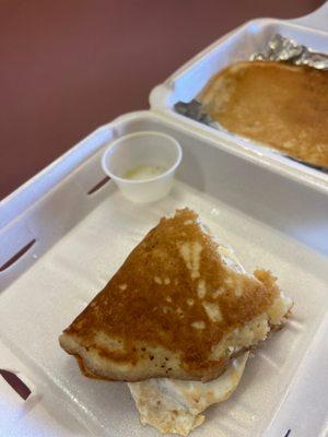 Had to make shift eat the egg in pancakes because they didn't give us Togo silverware? Also empty butter equals dry pancakes.