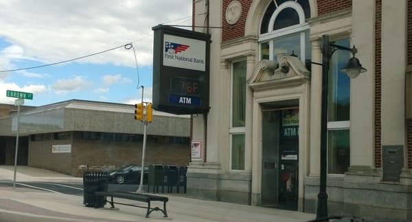 Street view front of bank. Atm just inside the door