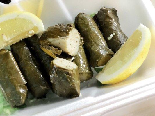 Grape leaves, stuffed with rice and vegetables. Lemony Delicious!
