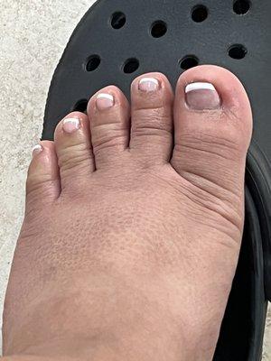 I understand my toes aren't the nicest but how she made the lines you can clearly tell it wasn't done precise