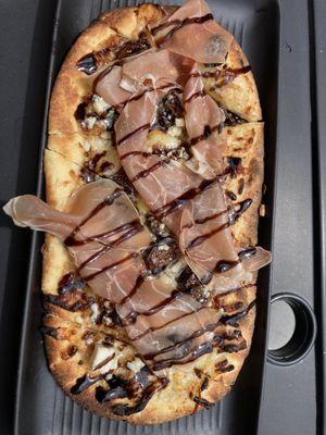 Prosciutto and fig flat bread with goats cheese and balsamic drizzle