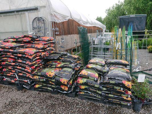 Compost, soil, cages, supports - they got it all!