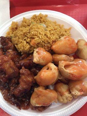 Spicy orange chicken and sweet and sour pork combo.