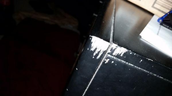 Dresser they dragged along the ground outside the door