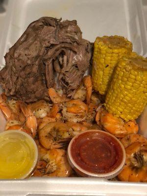 To go: 1 turkey, 1/2 pound shrimp, 2 corns with butter and cocktail sauce