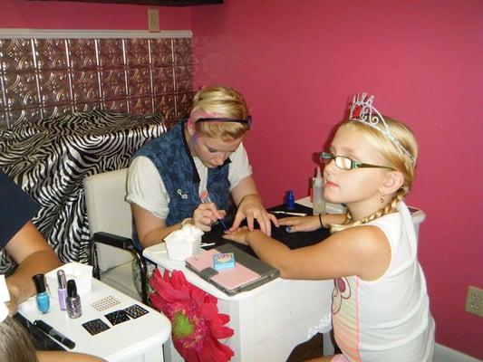 Kendell getting her nails painted at her 8th birthday party!