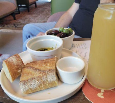 Enjoying olives and bread with oil from the snack menu and sharing the brewery's Pale Ale with Steve!