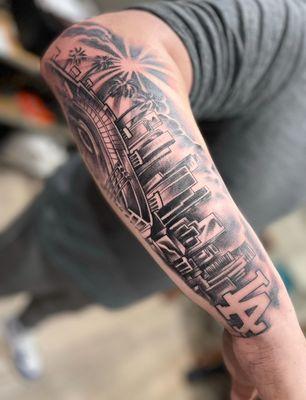 Hey Dodger fans... come in and a get a tattoo like we did for our friend Carlos. Call us to make an appointment
