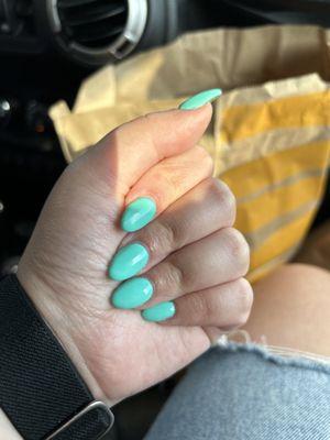 Just got these done here love them best first set of acrylic nails ever .