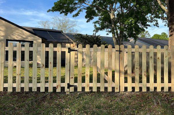 Picket wood fence