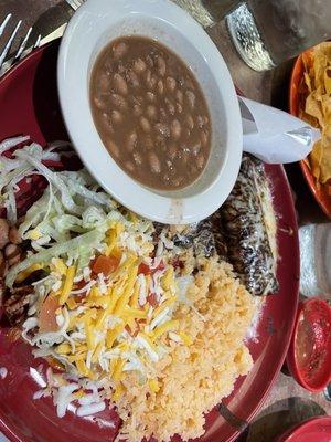 Combo plate of chicken mole enchilada and pulled pork tostada