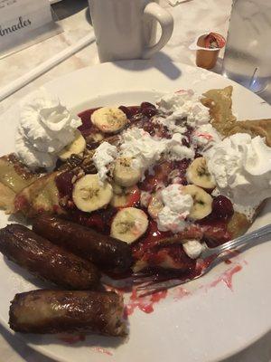 Raspberry Banana Pecan crepes with a side of link sausages. Their like home made. Crepes not lite tender very thin.