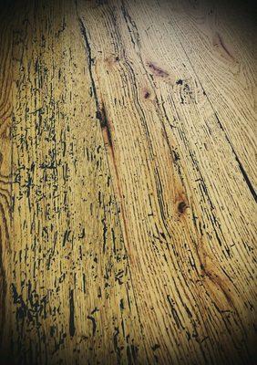 Reclaimed white oak with black filled insect damage and clearcoat.