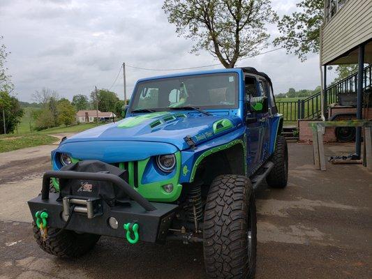 The awesome paint job and hood installation, Brian and his staff did.