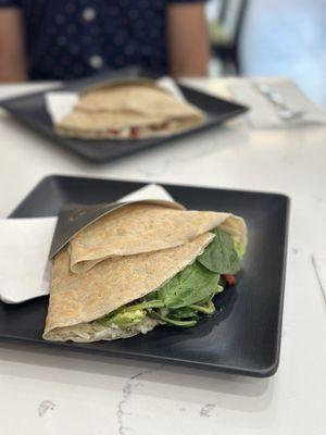 Build your own vegan crepe with spinach, peppers, olives, avocado, and za'atar sauce