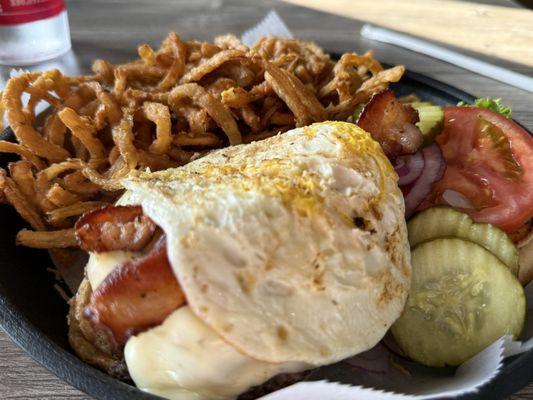 Onion rings and Big D burger with fried egg on top